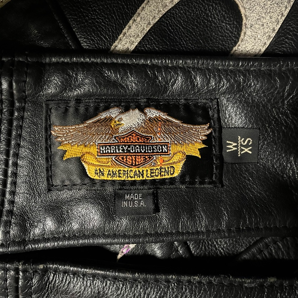 Black leather motorcycle chaps